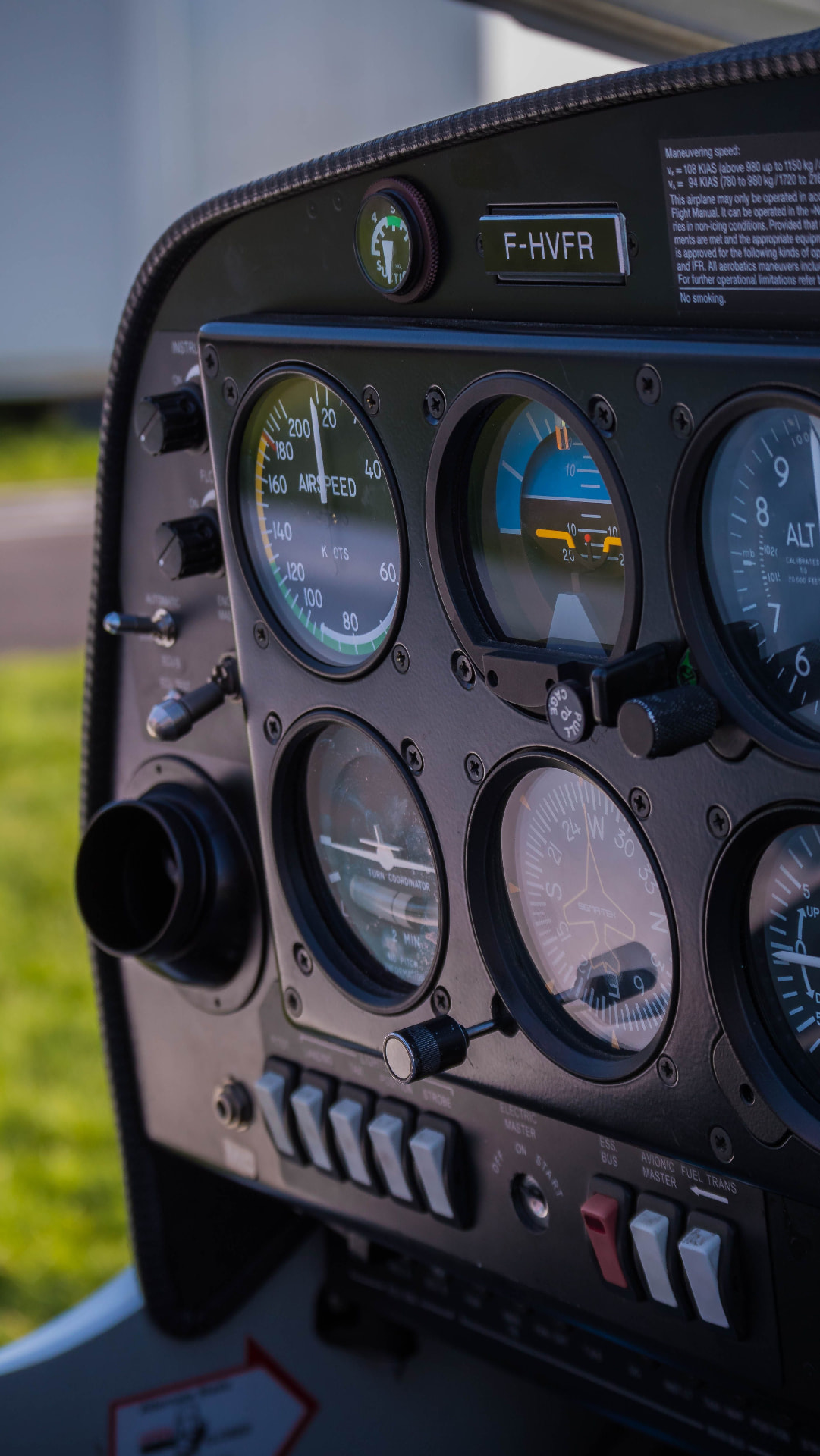 Close view of traditional aircraft flight instruments