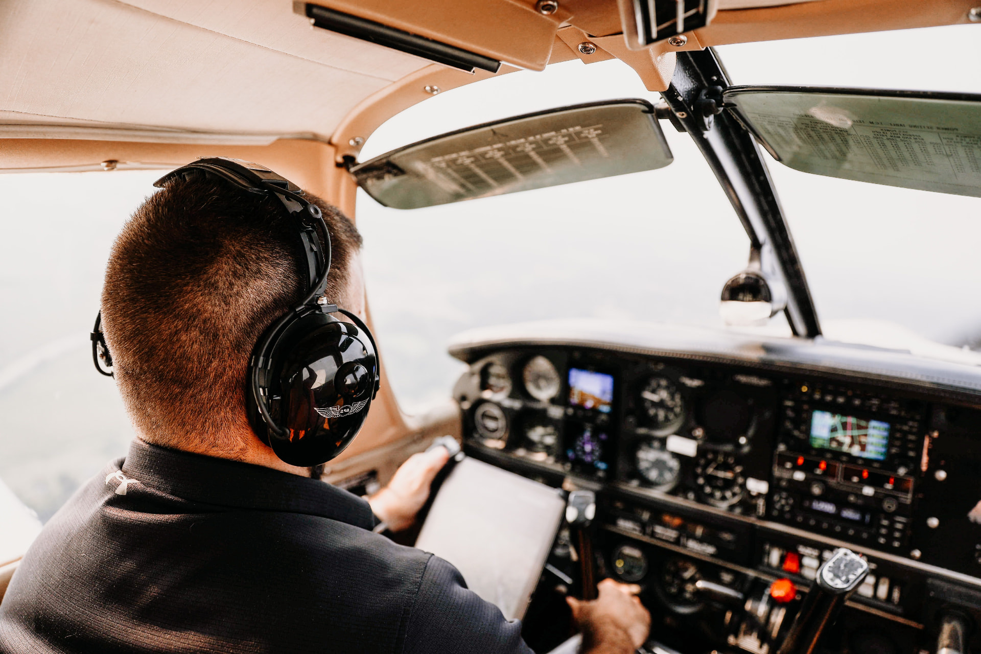 Pilot flying a light aircraft by reference to the instrument panel